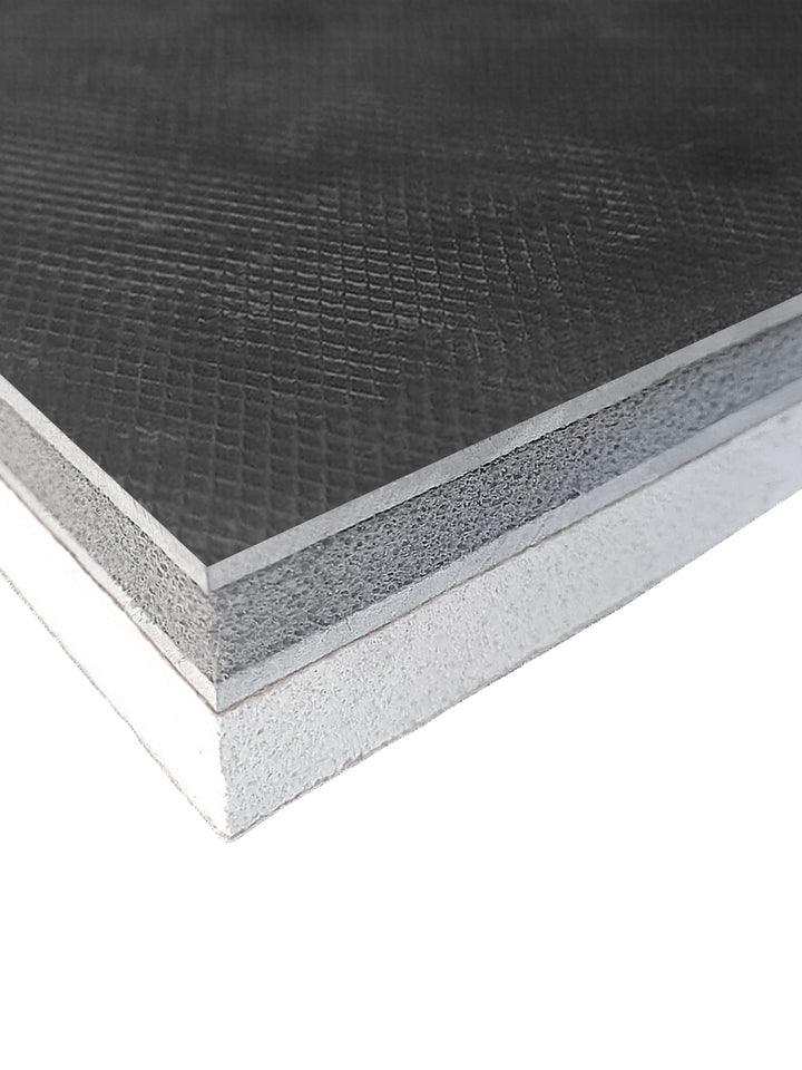 Close-up of 30mm Acoustic Silent Board for Solid Walls, showing layered structure: textured black facing, gray foam core, and white backing. Designed for effective soundproofing and noise reduction in homes.