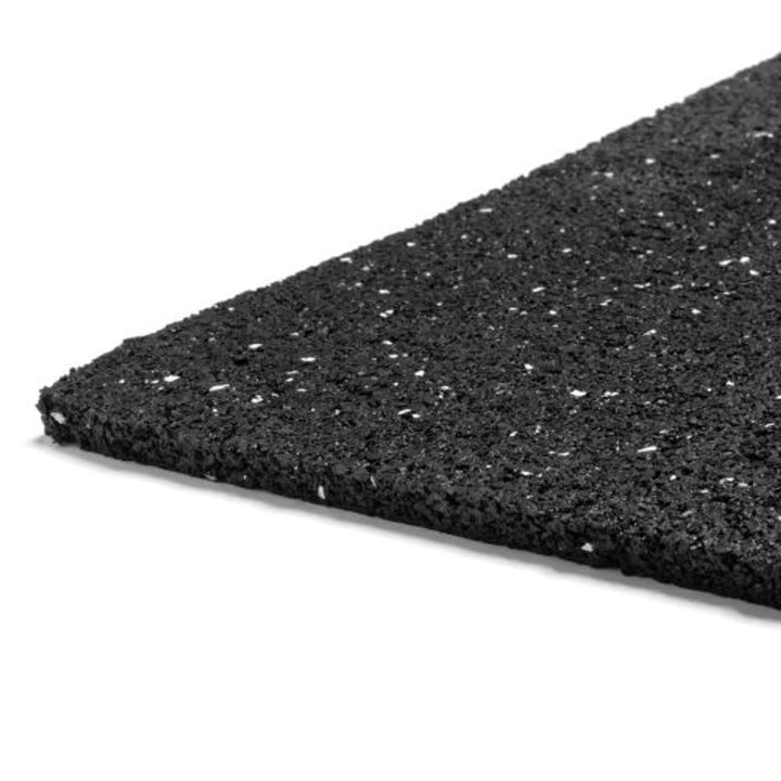 Close-up edge view of recycled rubber acoustic underlay mat showing textured surface.