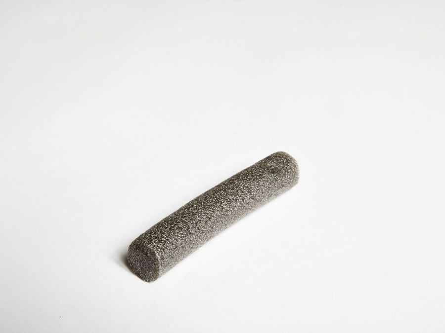 SilentCloud Seal 20 – Perimeter Sealing Solution: A cylindrical, 20mm diameter dark gray open-cell foam tube, ideal for acoustic isolation. Perfect for soundproofing, noise reduction, and sound insulation applications in various settings.