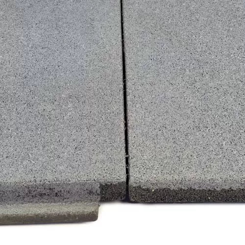 SilentTile 30mm Acoustic Gym Flooring Fitness Interlocking Tile, featuring textured gray surfaces and black foam core, offers superior soundproofing, acoustic insulation, and noise reduction, ideal for high-traffic and vibration-sensitive environments.