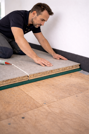 SilentCloud™ Acoustic Deck Pro 28 – High-Mass Cementitious T&G Acoustic Floorboard (28mm) with 10mm Resilient Layer