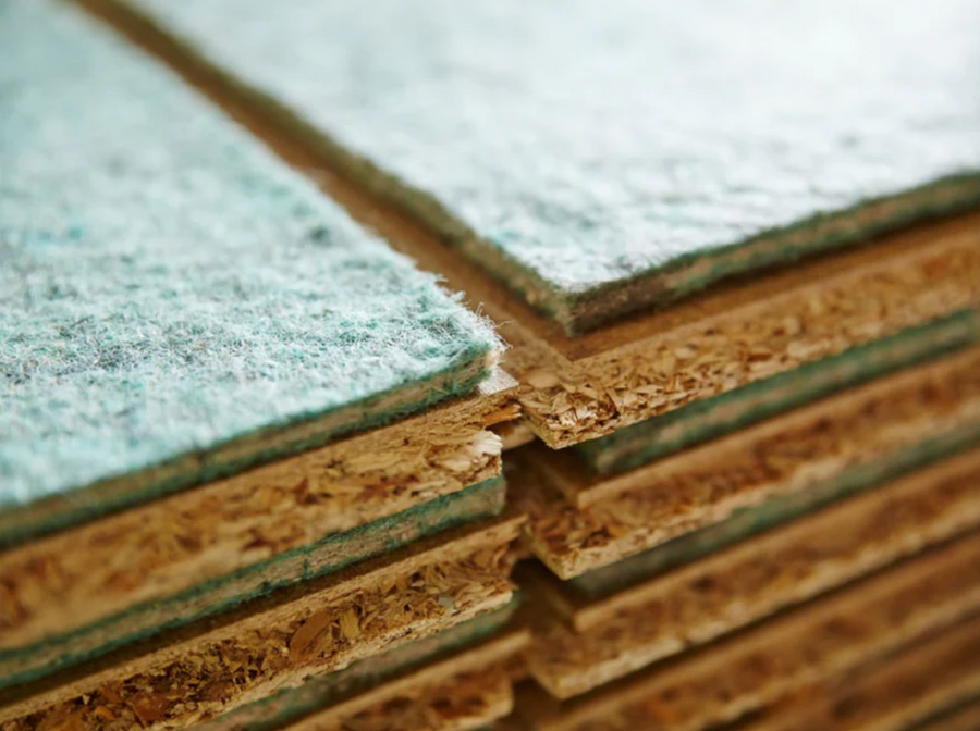 SilentCloud Panel 23 - Acoustic overlay board features green-tinted foam layer on engineered wood for soundproofing and noise reduction, ideal for concrete floors in residential and commercial applications.